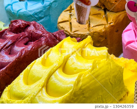 Bright gelato flavors on display. Dessert, color, and culinary art in frozen sweets. Bright gelato flavors on display. Dessert, color, and culinary art in frozen sweets. 130426359