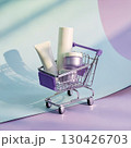 Skincare tube, jar, and bottle in purple cart with soft shadows on pastel curved background 130426703