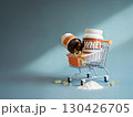 Whey protein and vitamin capsules in shopping cart with powder spill on blue background, symbolizing fitness supplementation and active lifestyle 130426705
