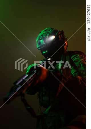 Tactical Soldier in Action Helmet On Off Dramatic Lights Smoke Tactical Soldier in Action Helmet On Off Dramatic Lights Smoke 130427612