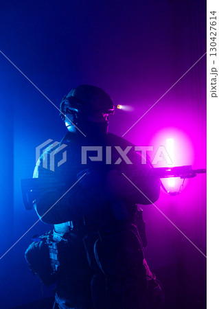 Tactical Soldier in Action Helmet On Off Dramatic Lights Smoke 130427614