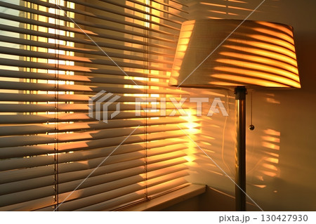 Abstract Shadows of Blinds on Wall in Warm Sunlight 130427930