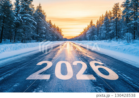 The text 2026 on the road with beautiful natural Lapland landscape and sunset sky. 130428538