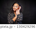 Young woman with vitiligo skin disorder looking at 130429296