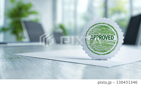 Approved stamp on document in modern office setting, conveying sense of success and professionalism. green stamp stands out against white paper, enhancing positive atmosphere Approved stamp on document in modern office setting, conveying sense of success and professionalism. green stamp stands out against white paper, enhancing positive atmosphere 130431346