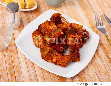 Fried pork ribs served on platter Fried pork ribs served on platter 130432680