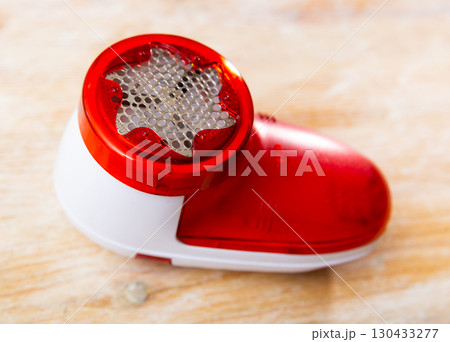 Handheld machine for removing fabric pills from garments Handheld machine for removing fabric pills from garments 130433277