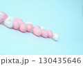 Scattered pink white eggs circles for decoration on blue 130435646