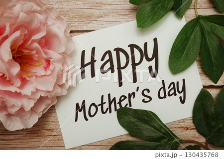 Happy Mothers day typography text on wooden background Happy Mothers day typography text on wooden background 130435768
