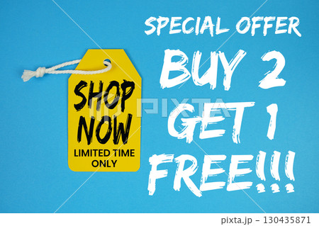 Buy 2 Get 1 Free!!! special offer with pric tag on blue background Buy 2 Get 1 Free!!! special offer with pric tag on blue background 130435871