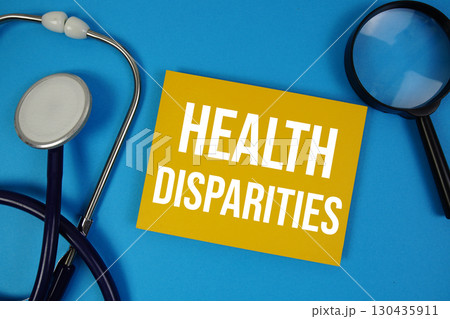 Health Disparities text with Stethoscope and magnifying glass on blue background Health Disparities text with Stethoscope and magnifying glass on blue background 130435911