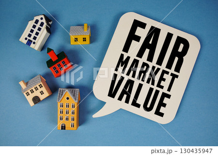 FMV Fair Market Value text with house models on blue background FMV Fair Market Value text with house models on blue background 130435947