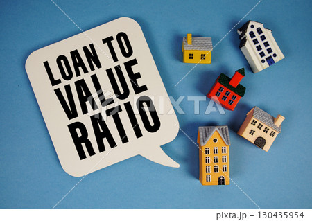 LTV Loan-to-Value Ratio text with house models on blue background LTV Loan-to-Value Ratio text with house models on blue background 130435954
