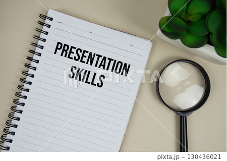 Presentation Skills text on paper notebook with magnifying glass on beige leather background Presentation Skills text on paper notebook with magnifying glass on beige leather background 130436021