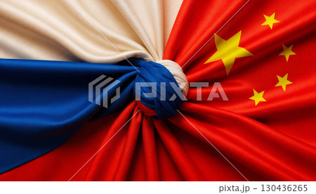 flags of russia and china tied in a knot and lying next to each other, peace concept flags of russia and china tied in a knot and lying next to each other, peace concept 130436265