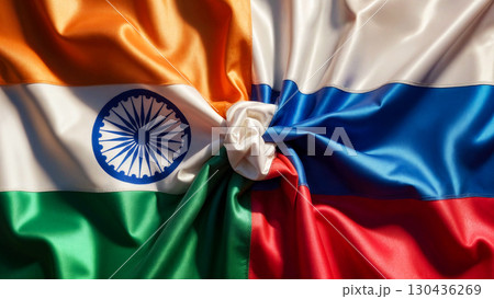 flags of russia and india tied in a knot and lying next to each other, concept of cooperation flags of russia and india tied in a knot and lying next to each other, concept of cooperation 130436269