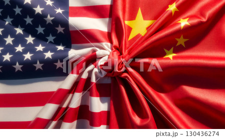 flags of the usa and china tied in a knot and lying next to each other top view flags of the usa and china tied in a knot and lying next to each other top view 130436274
