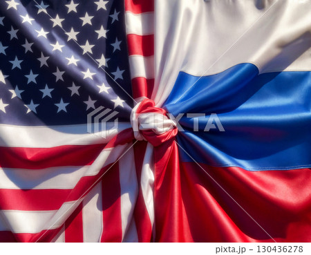 flags of the usa and russia tied in a knot and lying next to each other, peace concept flags of the usa and russia tied in a knot and lying next to each other, peace concept 130436278
