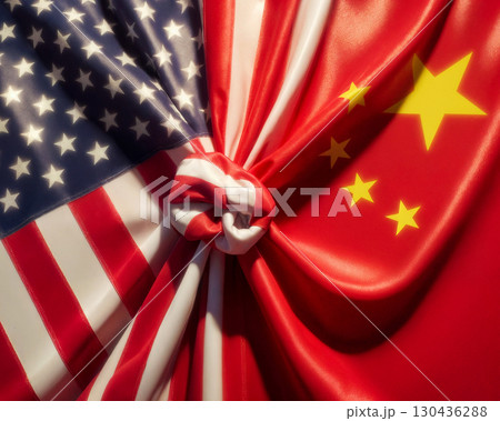 close up of usa and china tied in a knot and lying next to each other top view close up of usa and china tied in a knot and lying next to each other top view 130436288