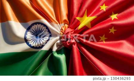 flags of china and india tied in a knot and lying next to each other, friendship of countries flags of china and india tied in a knot and lying next to each other, friendship of countries 130436293