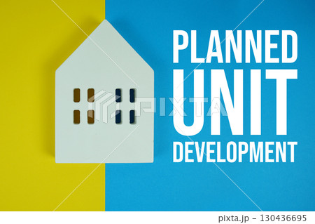 PUD Planned Unit Development text with house models on blue background PUD Planned Unit Development text with house models on blue background 130436695