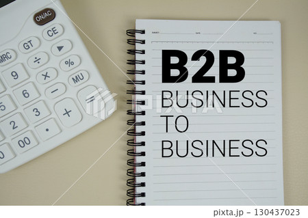 B2B Business to Business text with calculator phrase of business and financial concept B2B Business to Business text with calculator phrase of business and financial concept 130437023