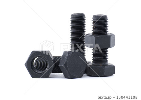 Close-Up of Black Metal Nuts and Bolts Isolated on White Background Close-Up of Black Metal Nuts and Bolts Isolated on White Background 130441108