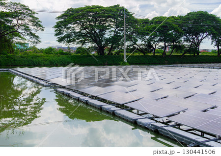 Floating Solar Panel. Solar photovoltaic panel PV System in Industry lake water pond Floating Solar Panel. Solar photovoltaic panel PV System in Industry lake water pond 130441506