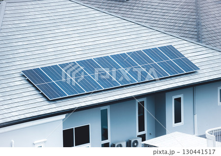 Solar roof top, Solar panel installed at modern house roof for saving home energy electricity cost. 130441517