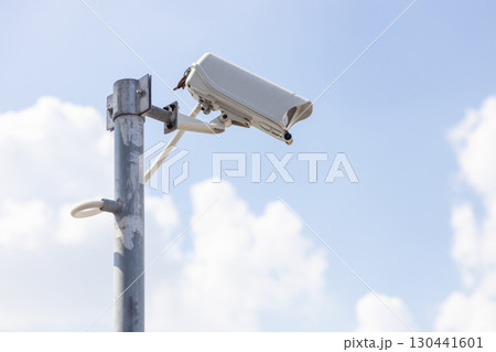 CCTV outdoor camera, building security guard. area safety surveillance cam with blue sky background CCTV outdoor camera, building security guard. area safety surveillance cam with blue sky background 130441601