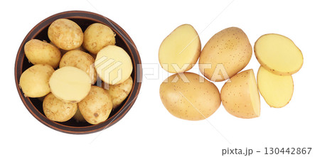 young potato slices in ceramic bowl isolated on white background. Harvest new. Top view. Flat lay. young potato slices in ceramic bowl isolated on white background. Harvest new. Top view. Flat lay. 130442867