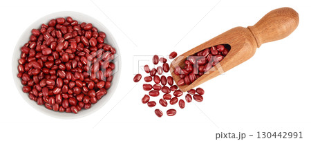 Red adzuki beans in ceramic bowl and wooden scoop isolated on white background. Top view. Flat lay. 130442991