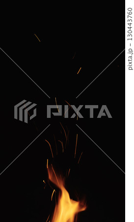 fire flames of campfire with sparks over black background, for overlay fire flames of campfire with sparks over black background, for overlay 130443760