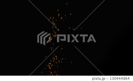 sparks and embers from campfire flying over black background 130444864
