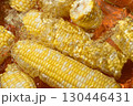 Fresh Corn Cobs Splashing in Water Top View. 130446431