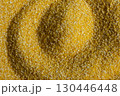 Abstract Yellow Cooking Corn Grits Background. 130446448