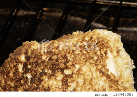Close up of toasted burger bun being grilled Close up of toasted burger bun being grilled 130448088