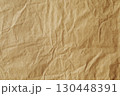 Macro focus of brown crumpled stained paper texture 130448391