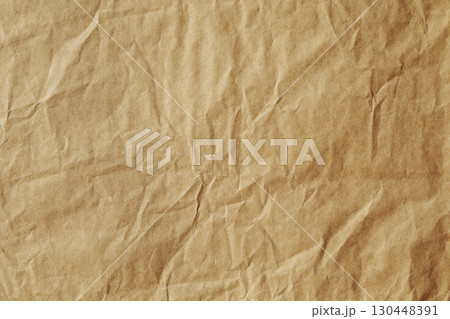 Macro focus of brown crumpled stained paper texture 130448391