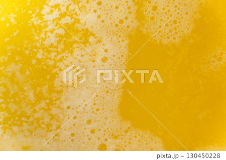 The process of making ghee from butter, macro texture. 130450228
