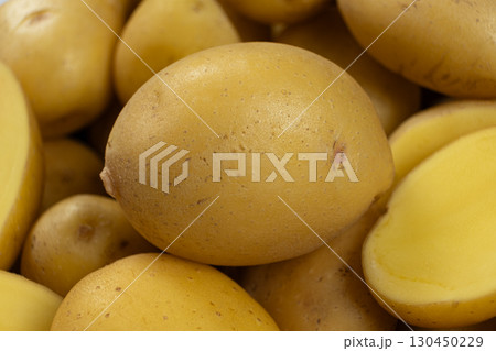 Fresh raw unpeeled potatoes close-up 130450229