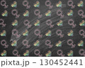 Chalk artwork featuring gender symbols and rainbow hearts on a blackboard. 130452441
