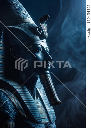 Blue statue of Ra, the ancient Egyptian sun god, shrouded in mysterious smoke 130454595