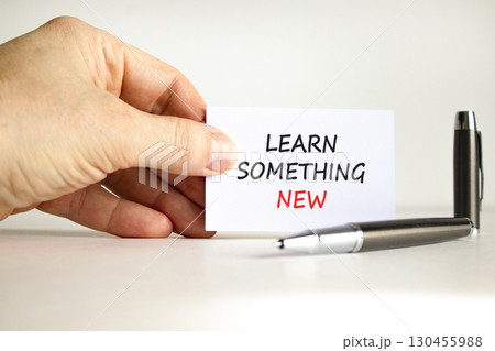 Learn something new symbol. Concept words Learn something new on beautiful note. Beautiful white background. Businessman hand. Business motivational lifestyle learn something new concept. Copy space. Learn something new symbol. Concept words Learn something new on beautiful note. Beautiful white background. Businessman hand. Business motivational lifestyle learn something new concept. Copy space. 130455988