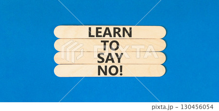 Learn to say no symbol. Concept words phrase Learn to say no on beautiful wooden stick. Beautiful blue paper background. Business psychological Learn to say no concept. Copy space. Learn to say no symbol. Concept words phrase Learn to say no on beautiful wooden stick. Beautiful blue paper background. Business psychological Learn to say no concept. Copy space. 130456054