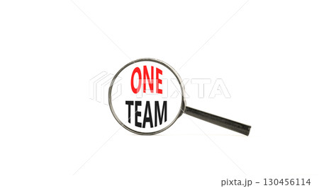 One team symbol. Concept word One team on beautiful magnifying glass. Beautiful white paper background. Black magnifying glass. Business one team concept. Copy space. One team symbol. Concept word One team on beautiful magnifying glass. Beautiful white paper background. Black magnifying glass. Business one team concept. Copy space. 130456114