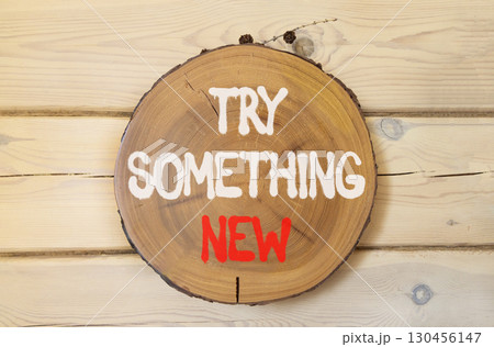 Try something new symbol. Concept words Try something new on beautiful wooden circle. Beautiful wooden wall background. Business motivational lifestyle try something new concept. Copy space. Try something new symbol. Concept words Try something new on beautiful wooden circle. Beautiful wooden wall background. Business motivational lifestyle try something new concept. Copy space. 130456147
