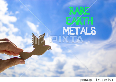 Pause and reflect symbol. Concept words Pause and reflect. Beautiful blue sky clouds background. Businessman hand, wooden birds. Business motivational lifestyle pause and reflect concept. Copy space. Pause and reflect symbol. Concept words Pause and reflect. Beautiful blue sky clouds background. Businessman hand, wooden birds. Business motivational lifestyle pause and reflect concept. Copy space. 130456194