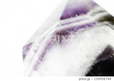Beautiful close up of quartz crystal rock shard with reflective rainbow spiritual light Beautiful close up of quartz crystal rock shard with reflective rainbow spiritual light 130456744