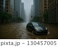 雨の降る夜の道路を走る車 130457005